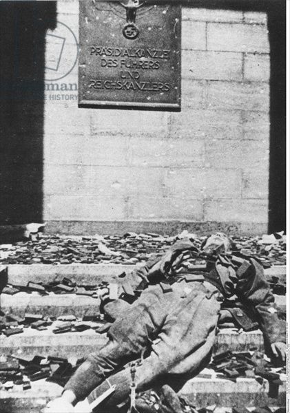 May-1945-The-dead-body-of-a-German-officer-lying-on-the-steps-of-the-Reich-Chancellery-following-the-Battle-of-Berlin.